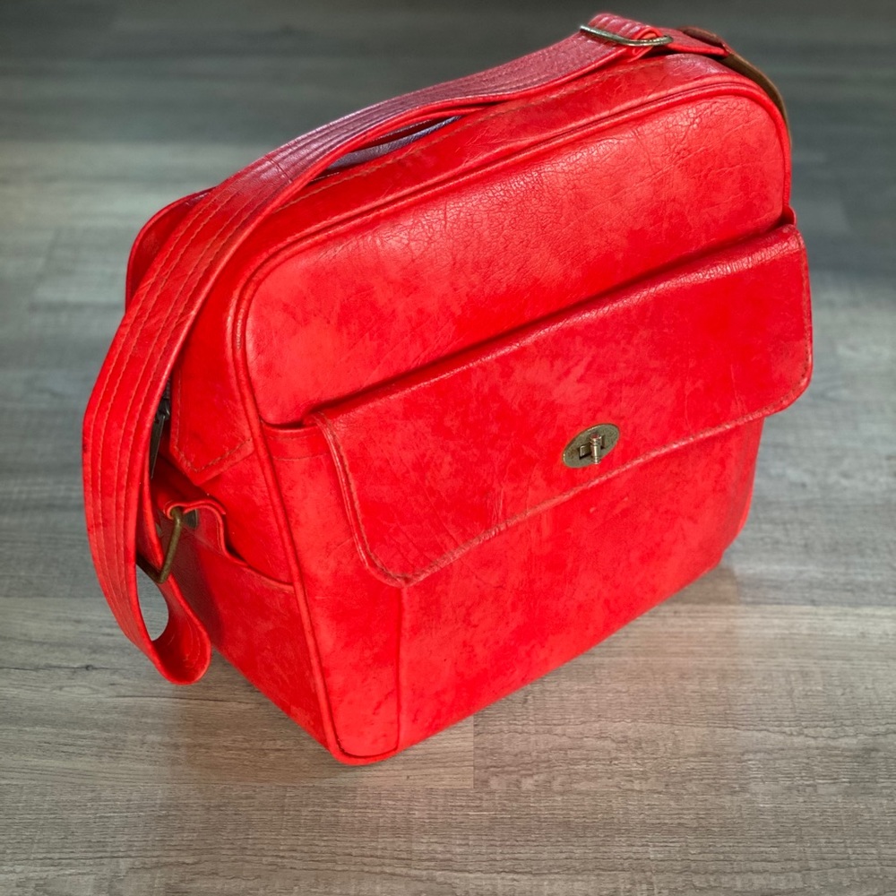Vintage red Samsonite Silhouette travel bag